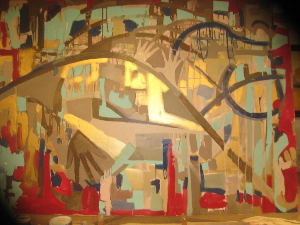 Large colorful abstract painting displayed in a studio