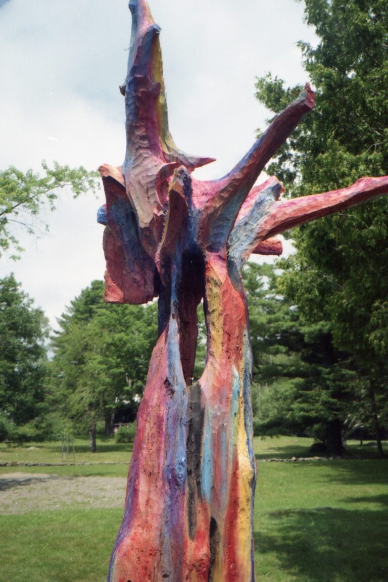 Close view of a branching red and green outdoor sculpture