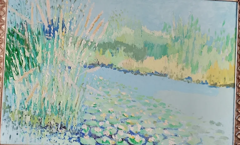 Pale blue painting with water lilies and a shoreline